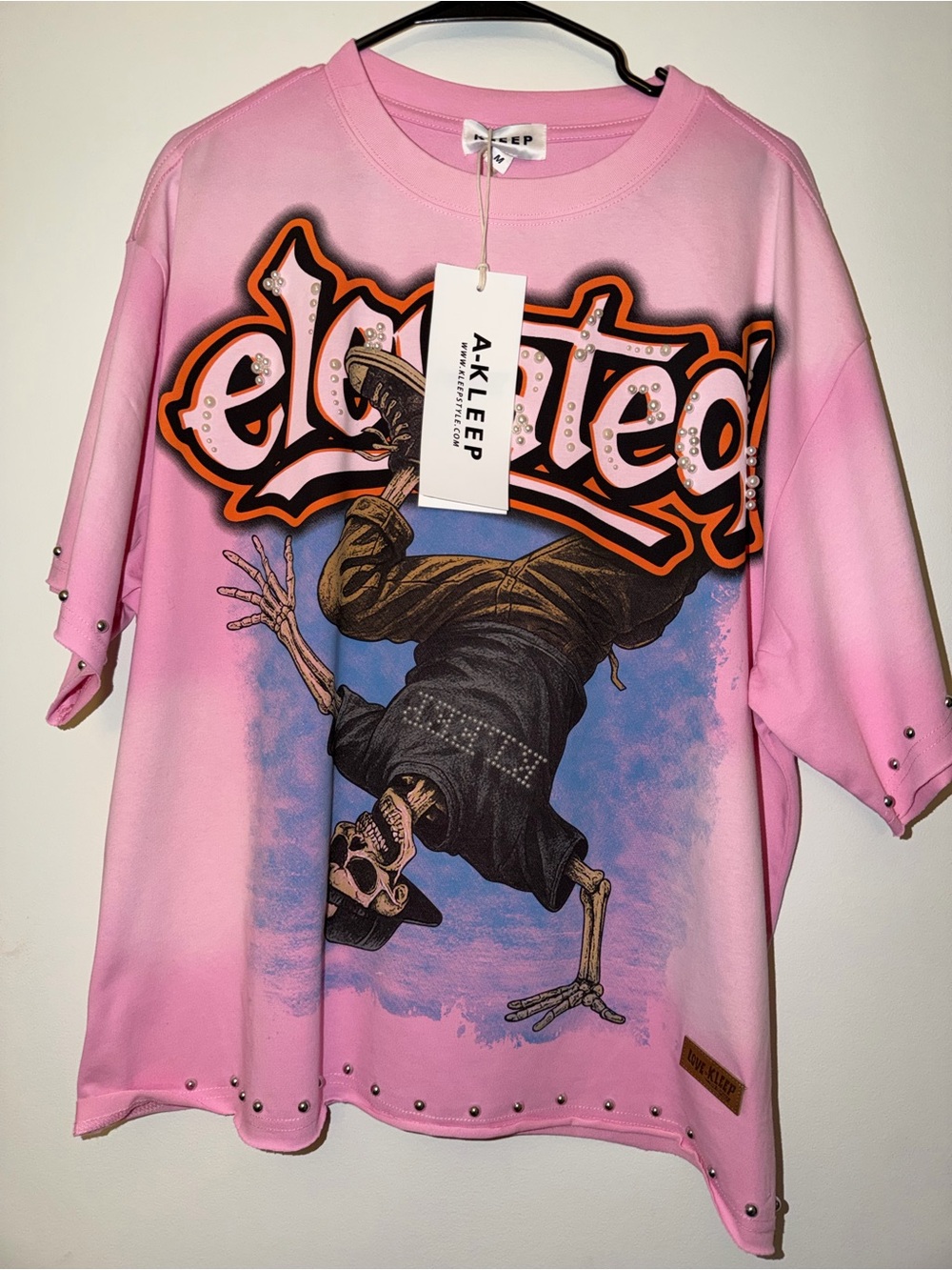 Pink Graphic Oversized Tee - "Elated" Skull Print